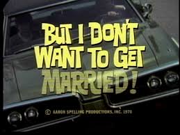 Movie poster tagline 'But I don't want to get married' over a dark car grille.