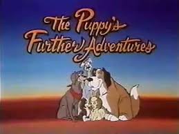 Title card for a cartoon: 'The Puppy's Further Adventures' with a group of dogs sitting together under a sunset sky.